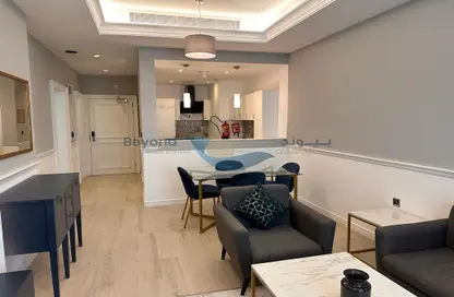 Living / Dining Room image for: Apartment - 1 Bedroom - 2 Bathrooms for rent in Al Sadd Road - Al Sadd - Doha, Image 1