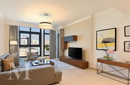 Living Room image for: Apartment - 1 Bedroom - 2 Bathrooms for rent in Le Mirage City Walk - Fereej Bin Mahmoud South - Fereej Bin Mahmoud - Doha, Image 1