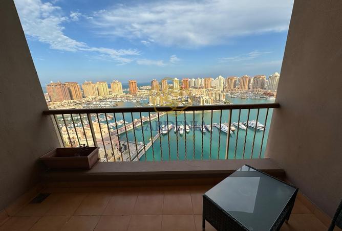 Apartment - 2 Bedrooms - 3 Bathrooms for rent in Tower 5 - Porto Arabia - The Pearl Island - Doha