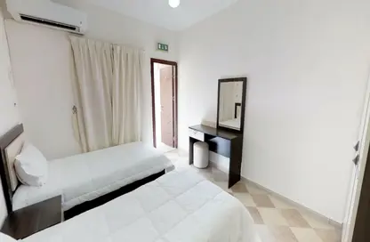 Apartment - 2 Bedrooms - 2 Bathrooms for rent in Ezdan Village 2 - Al Duhail - Doha