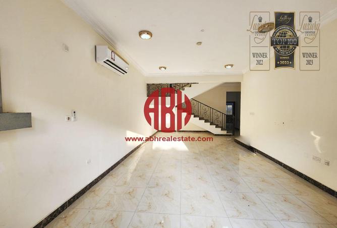 Compound - 6 Bedrooms - 6 Bathrooms for rent in Al Hanaa Street - Al Gharrafa - Doha