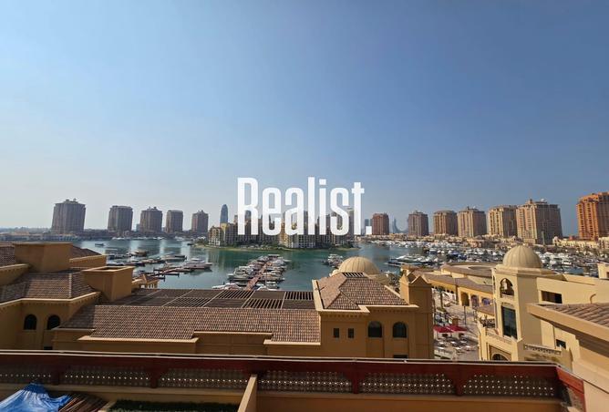 Apartment - 2 Bedrooms - 4 Bathrooms for sale in West Porto Drive - Porto Arabia - The Pearl Island - Doha