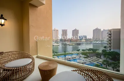Balcony image for: Apartment - 2 Bedrooms - 3 Bathrooms for sale in The St. Regis Marsa Arabia Island - Marsa Arabia - The Pearl Island - Doha, Image 1