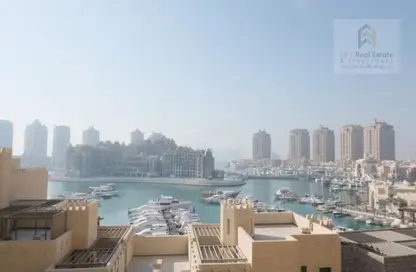 Apartment - 2 Bedrooms - 3 Bathrooms for sale in Tower 14 - Porto Arabia - The Pearl Island - Doha