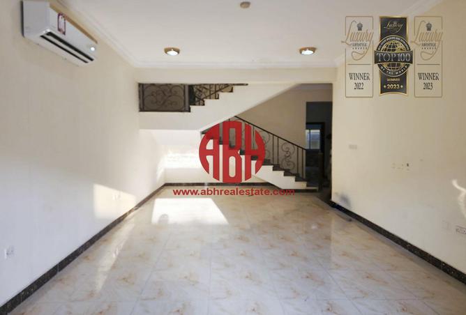 Compound - 6 Bedrooms - 6 Bathrooms for rent in Al Hanaa Street - Al Gharrafa - Doha