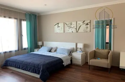 صورة لـ غرفة- غرفة النوم شقة - غرفة نوم - 2 حمامات للايجار في منازل تاون هاوس - بورتو أرابيا - جزيرة اللؤلؤة - الدوحة ، صورة رقم 1