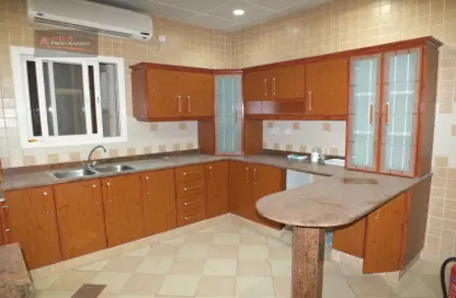 Kitchen image for: Apartment - 2 Bedrooms - 2 Bathrooms for rent in Najma 28 - Ibn Dirhem Street - Najma - Doha, Image 1