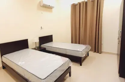 Apartment - 2 Bedrooms - 2 Bathrooms for rent in Muaither Area - Al Rayyan - Doha