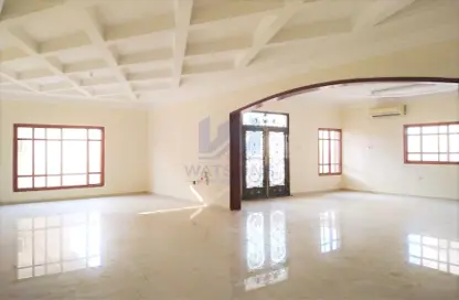 Villa - 7 Bedrooms - 6 Bathrooms for rent in Al Hamraa Street - Al Thumama - Doha