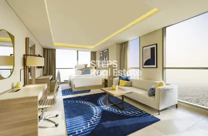 Living Room image for: Apartment - 1 Bathroom for rent in Al Shatt Street - West Bay - Doha, Image 1