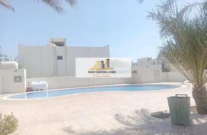 Compound - 4 Bedrooms - 5 Bathrooms for rent in Abu Hamour - Doha