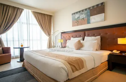 صورة لـ غرفة- غرفة النوم شقق فندقية - غرفة نوم - 2 حمامات للايجار في امبريال سويتس - سلاطة القديمة - سلاطة - الدوحة ، صورة رقم 1