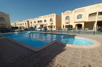 Villa - 5 Bedrooms - 4 Bathrooms for rent in Wadi Al Shaheeniya Street - Ain Khaled - Doha