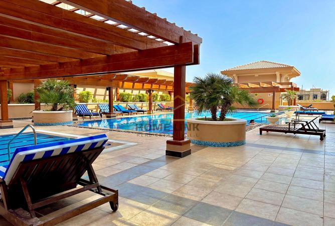 Apartment - 2 Bedrooms - 3 Bathrooms for sale in One Porto Arabia - Porto Arabia - The Pearl Island - Doha