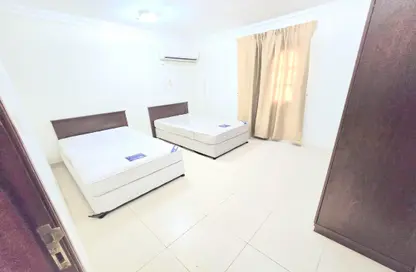 Apartment - 2 Bedrooms - 2 Bathrooms for rent in Al Mansoura - Al Mansoura - Doha