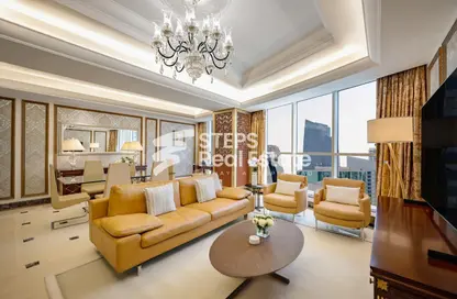 صورة لـ غرفة المعيشة شقة - 2 غرف نوم - 3 حمامات للايجار في شارع الشط - الخليج الغربي - الدوحة ، صورة رقم 1