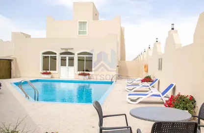 Pool image for: Compound - 4 Bedrooms - 4 Bathrooms for rent in Souk Al gharaffa - Al Gharrafa - Doha, Image 1