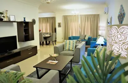 Living Room image for: Villa - 4 Bedrooms - 6 Bathrooms for rent in Alfardan Gardens 09 - Abu Sidra - Al Rayyan - Doha, Image 1