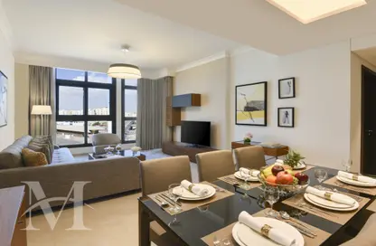 Living / Dining Room image for: Apartment - 1 Bedroom - 2 Bathrooms for rent in Le Mirage City Walk - Fereej Bin Mahmoud South - Fereej Bin Mahmoud - Doha, Image 1