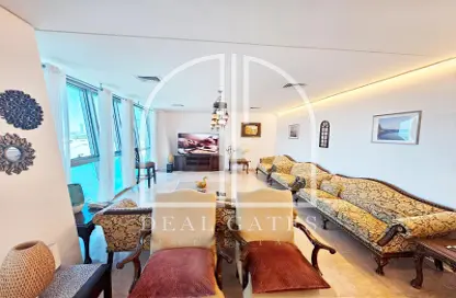 Living Room image for: Apartment - 3 Bedrooms - 5 Bathrooms for sale in Zig Zag Tower B - Zig Zag Towers - West Bay - Doha, Image 1